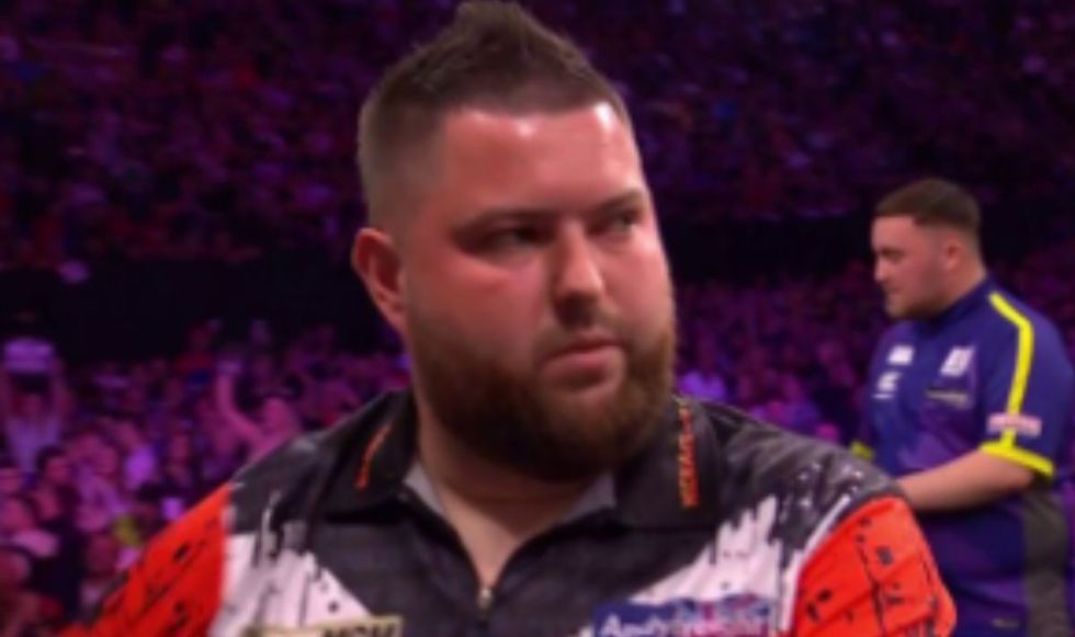Michael Smith didn't appear happy with his performance