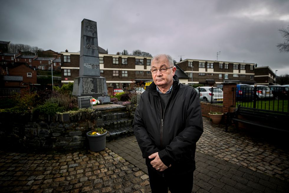 Mickey McKinney who's brother William was killed in Derry on Bloody Sunday standing beside the Bloody Sunday Memorial in Derry's Bogside.