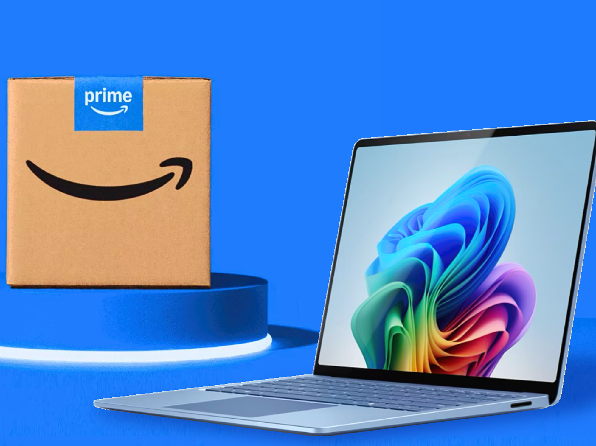 Microsoft Surface 13.8 Laptop in the bottom right corner with an amazon prime box in the background