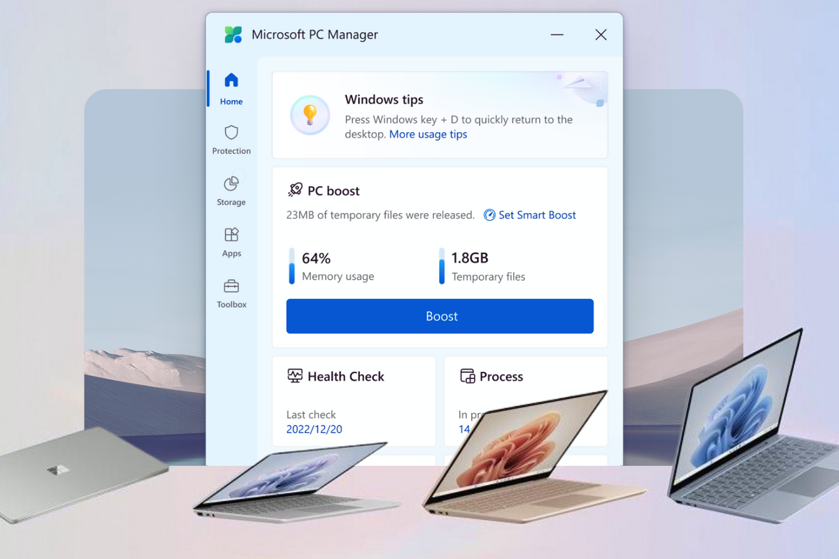 microsoft surface laptops are pictured opening in front of a screenshot of the new PC Manager app released by Microsoft 