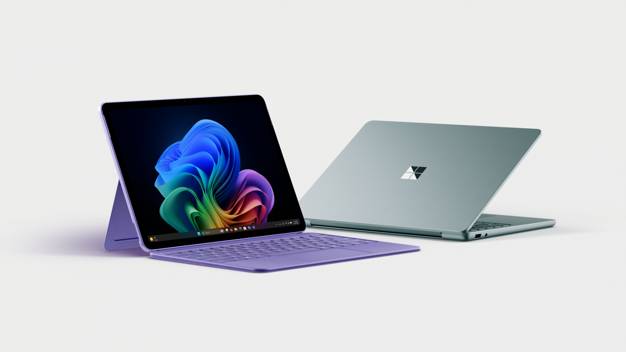 microsoft surface pro 12-inch in violet colour pictured on the left-hand side with surface laptop 13 in ocean pictured on the right, both shown on a plain background