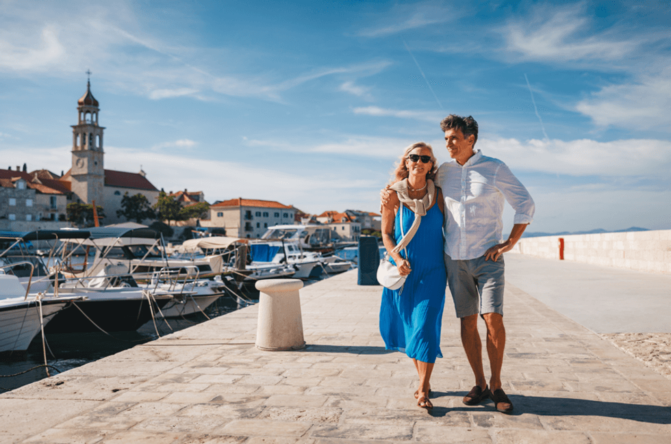 Middle aged couple on holiday by Adriatic coast Italy