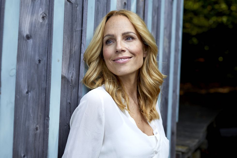 Middle aged woman with wavy hair