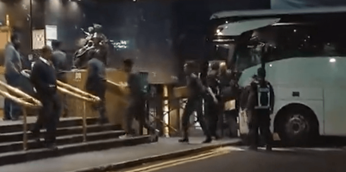 Bus-load of asylum seekers moved into London hotel in middle of the night Bus-load of asylum seekers moved into London hotel in middle of the night