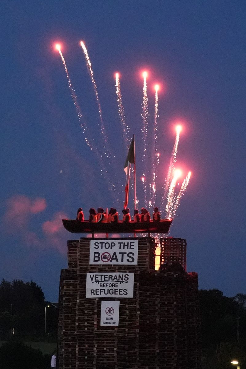 Migrant boat topped bonfire