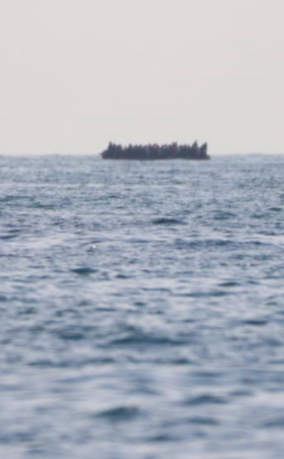 Migrant dinghy spotted crossing the Channel loaded