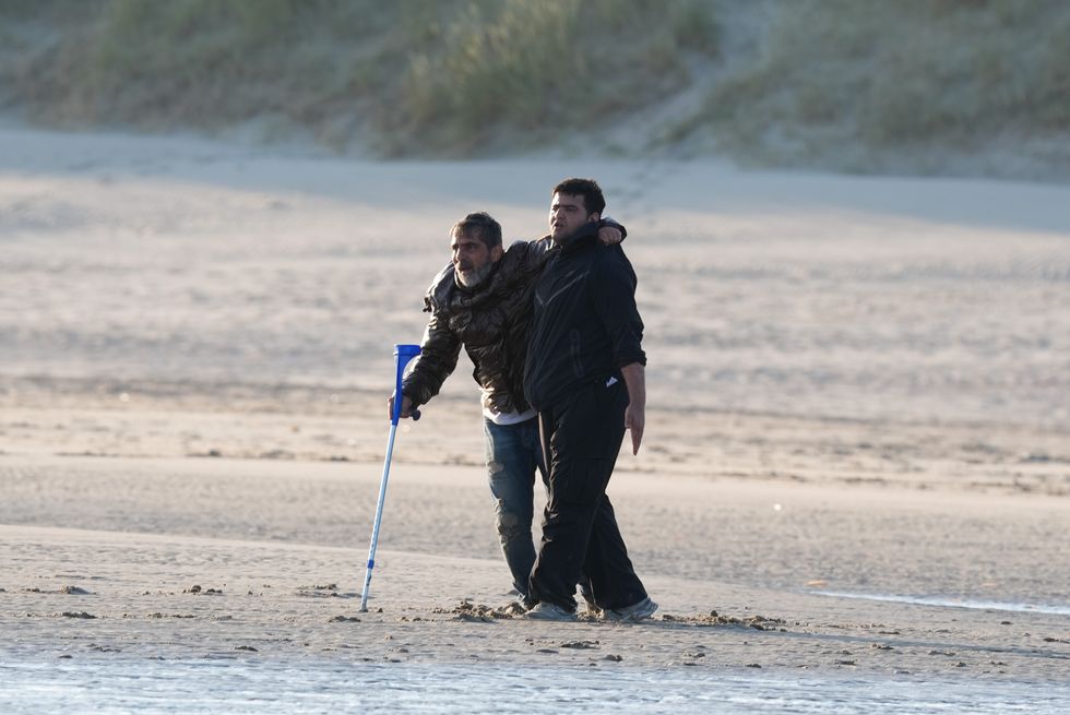 Migrant with crutch