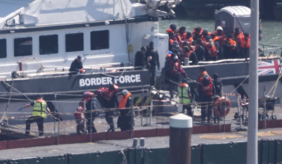 Migrants arrive on the Kent coast