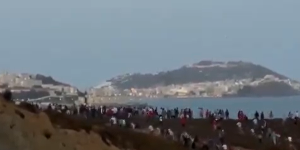 NextImg:Hundreds of African migrants storm Spanish border in coordinated attempt to cross into EU