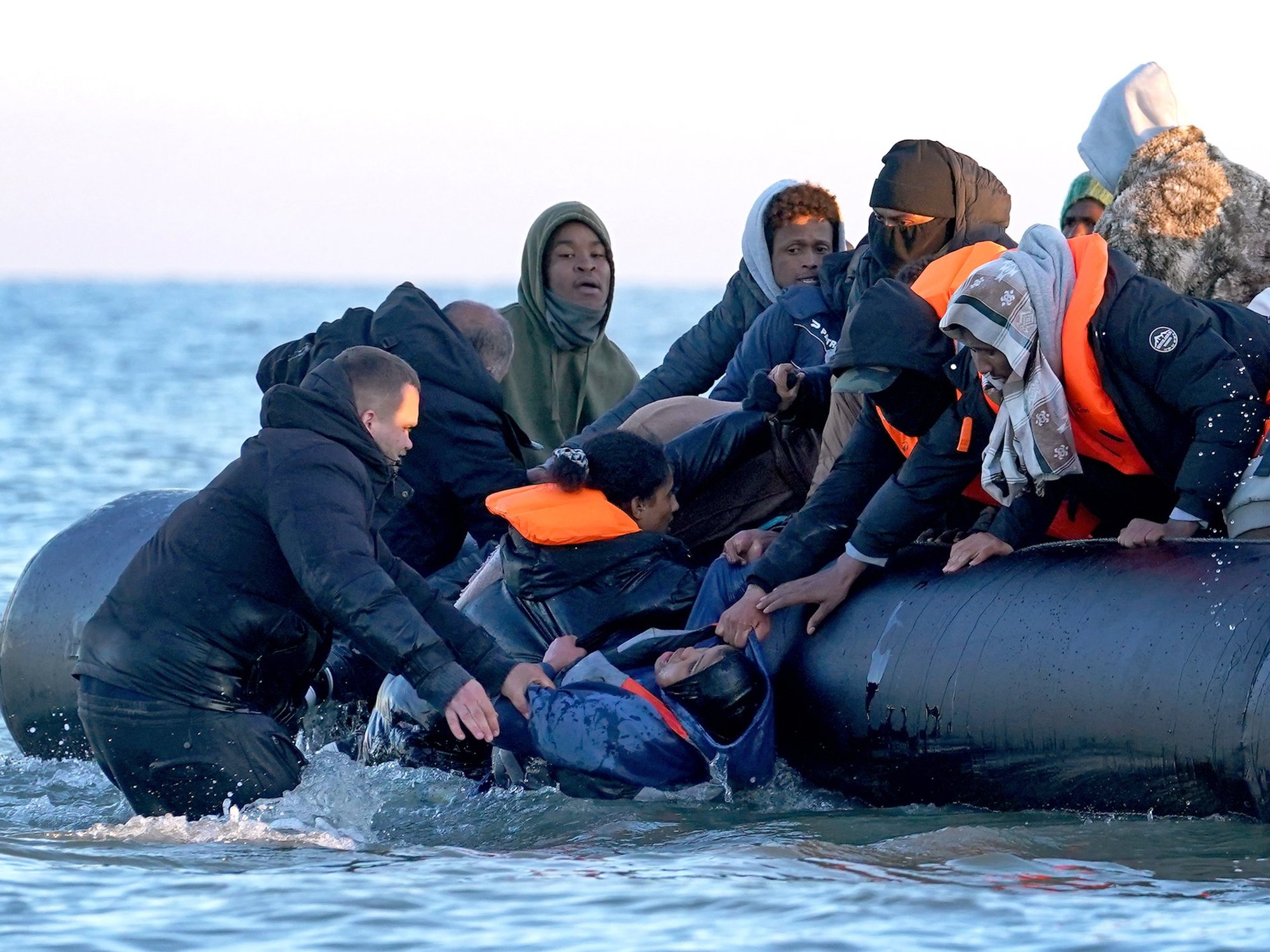 Migrants attempting to cross the Channel in a small boat