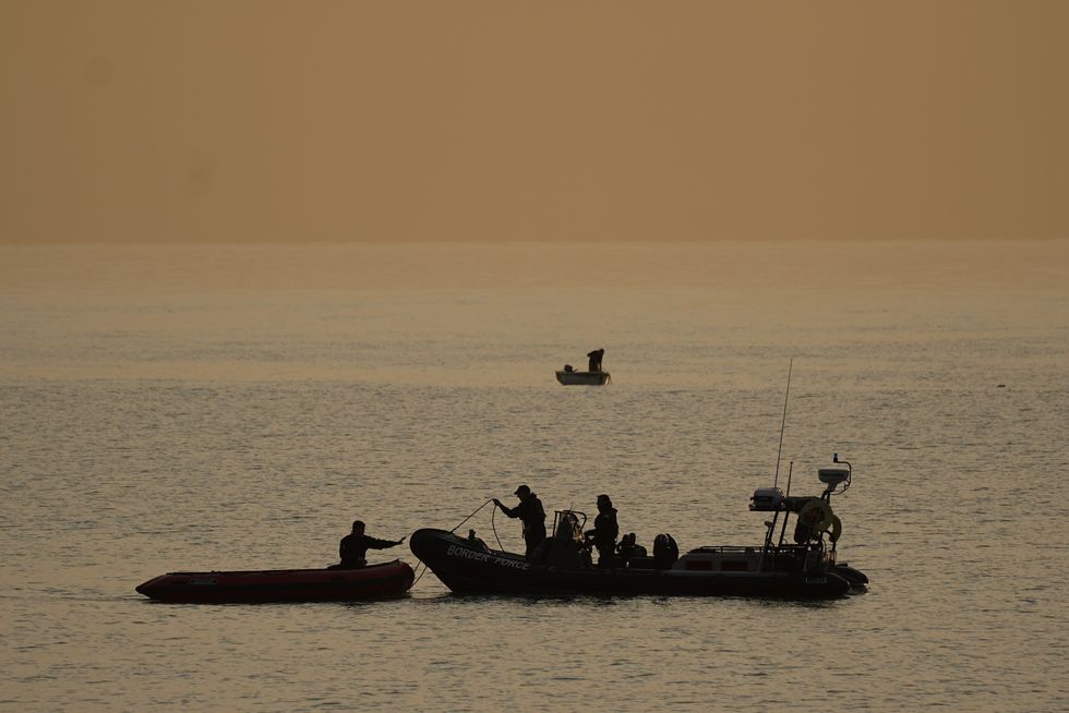 Migrants being rescued in the channel.