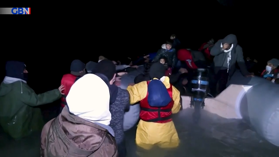 Migrants board boat in Channel
