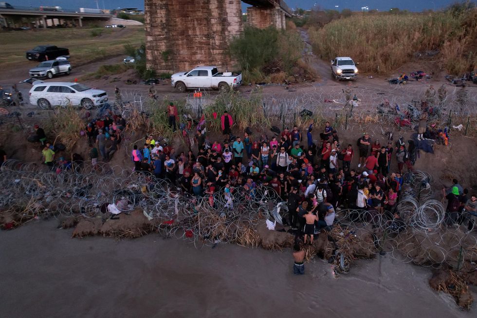 Migrants crossing the US border