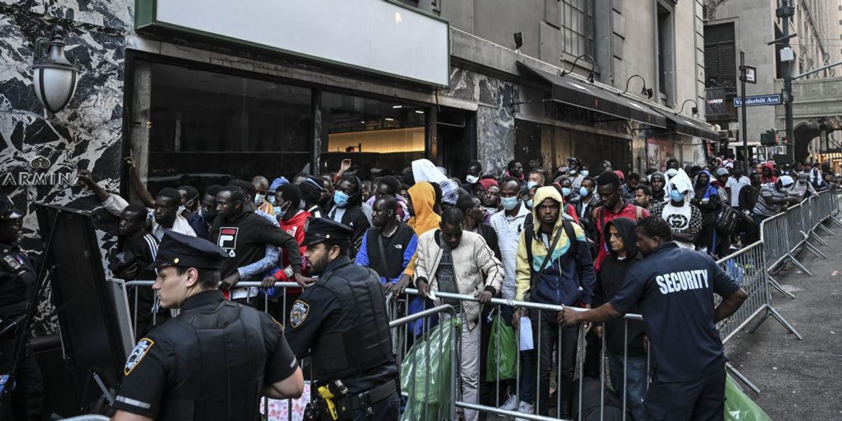 NextImg:US migrants reject 'bad sandwiches' and pancakes after going for help at NYC shelters