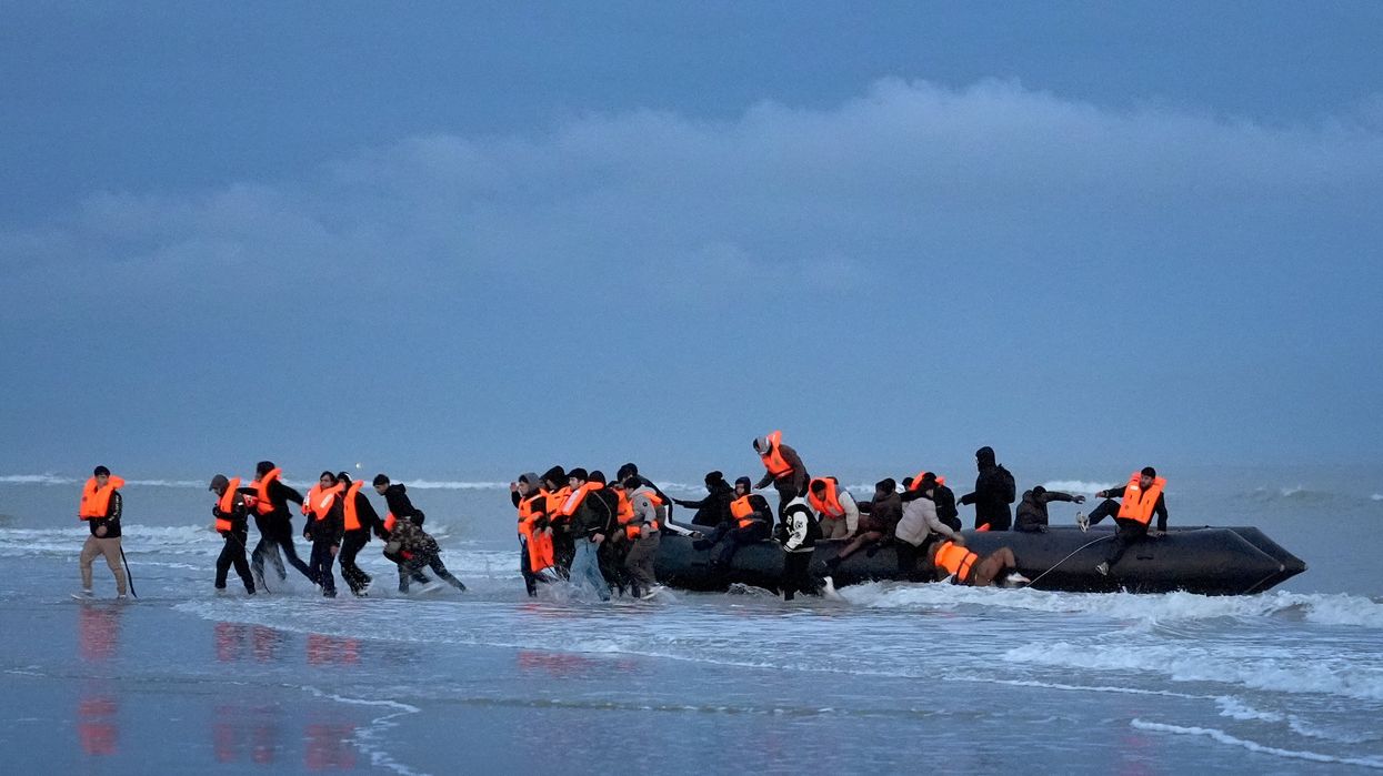 Migrants in a small boat