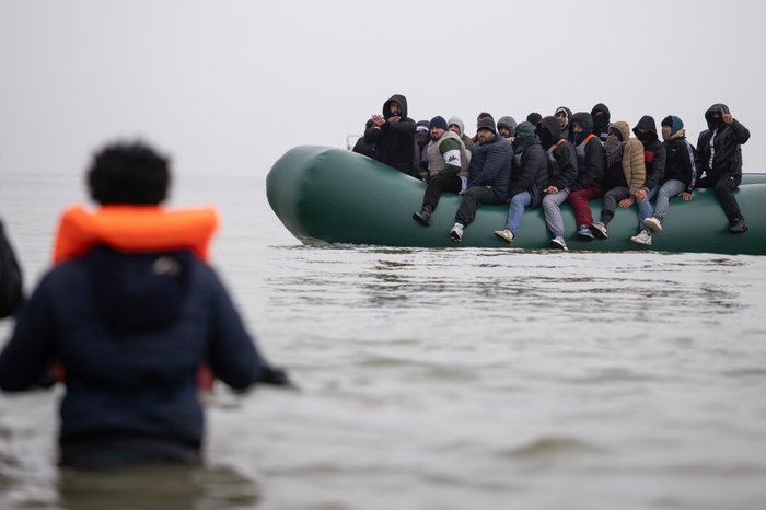 Migrants on board a dinghy on the coast off Gravelines, France
