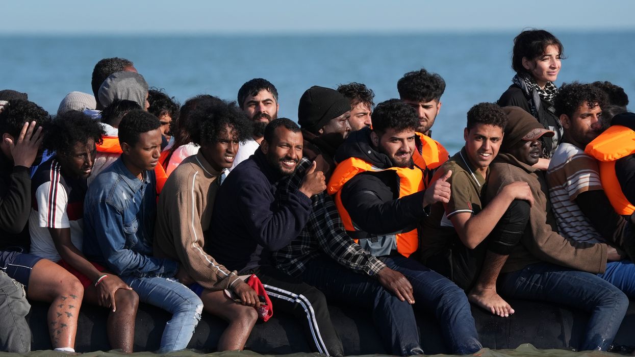 Migrants on board a small boat