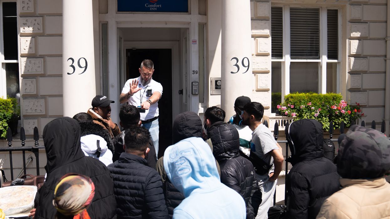 Migrants protest outside hotel in Pimlico, central London, over the living conditions inside