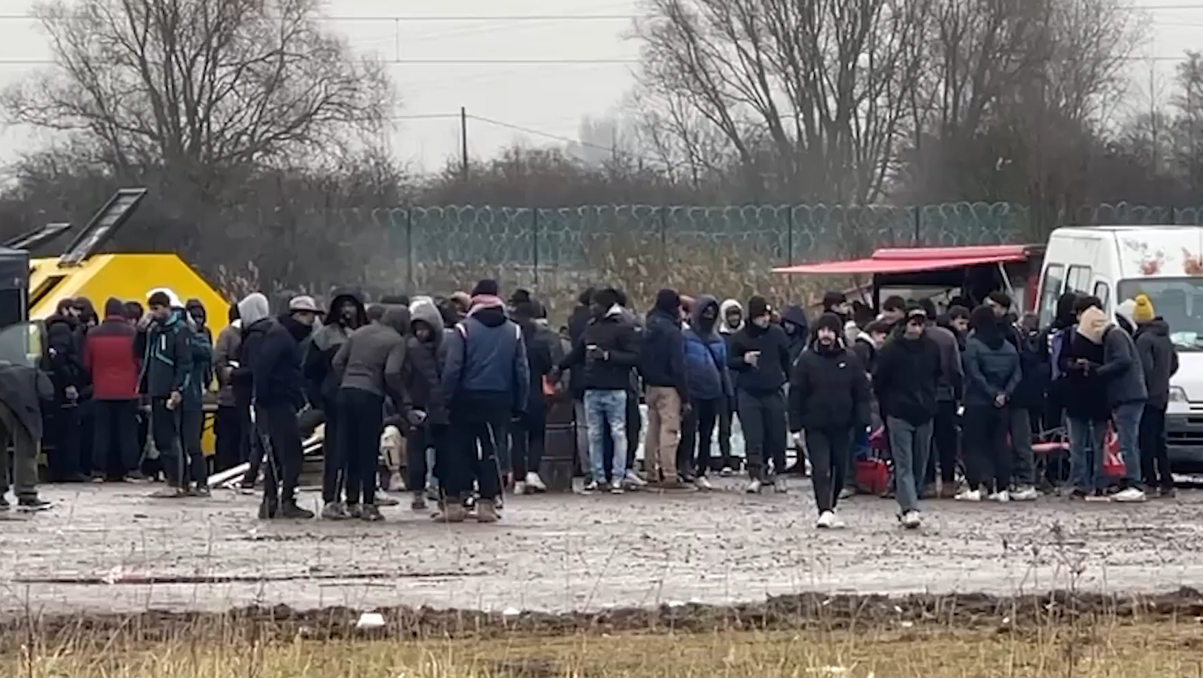 Migrants queueing in northern France