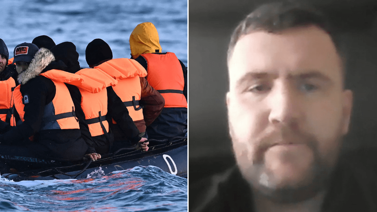 Migrants travel in an inflatable boat across the English Channel; Gary Doyle