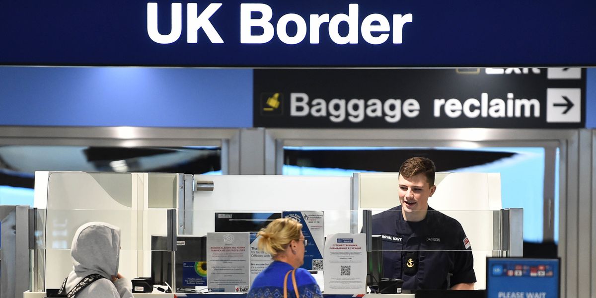 Namibian mother of three used two fake passports to live, bank and work illegally in Britain for 7 years