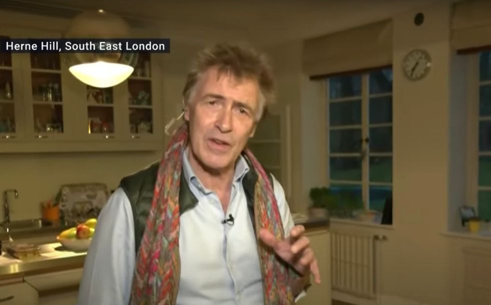 Mike Rundell spoke to presenter Nigel Farage from the kitchen of his London home in Herne Hill