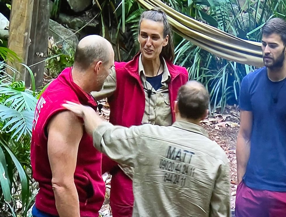 Mike Tindall is consoled by the other contestants after being voted off