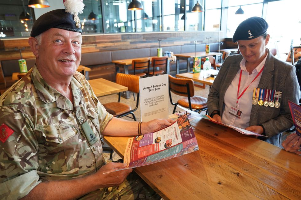 Military personnel and veterans dressed in armed forces uniforms