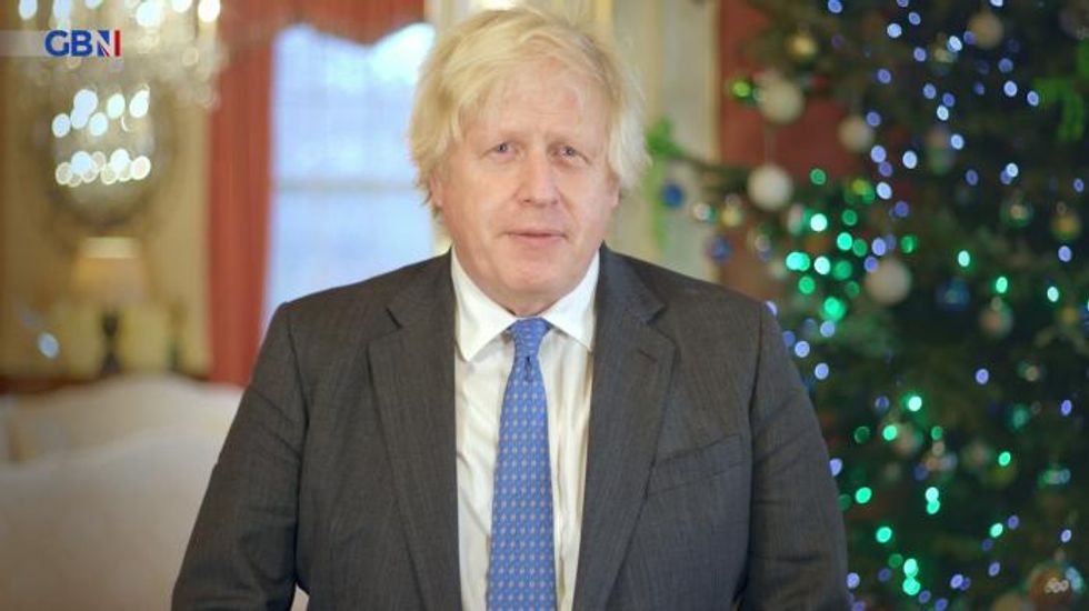 Boris Johnson urges booster jab take-up as new data suggests Omicron is milder