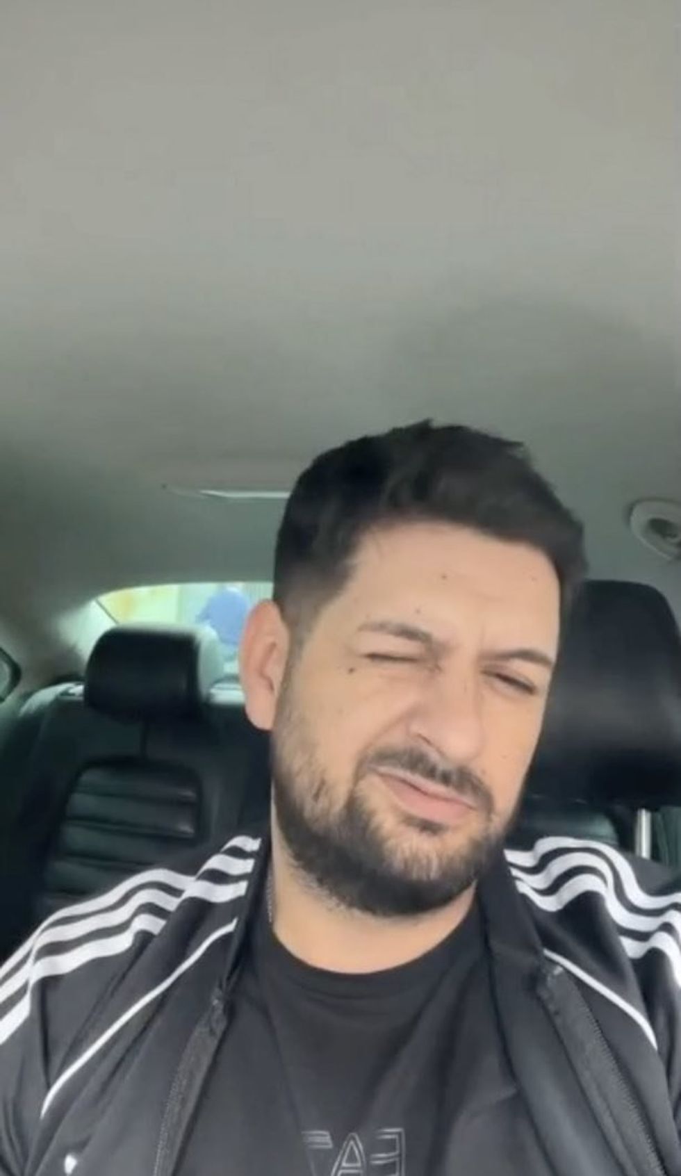 Mircea Marian Cumpanasoiu winking to the camera