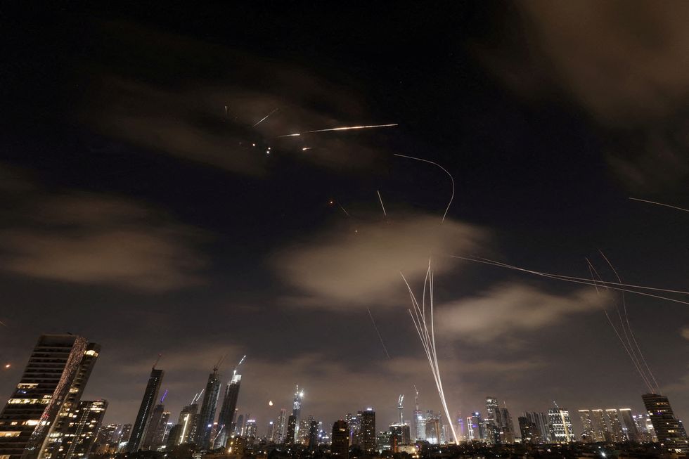 Missiles launched from Iran are intercepted as seen from Tel Aviv
