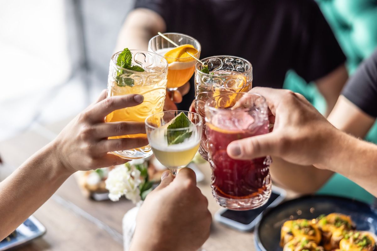 Mixed drinks held up in center