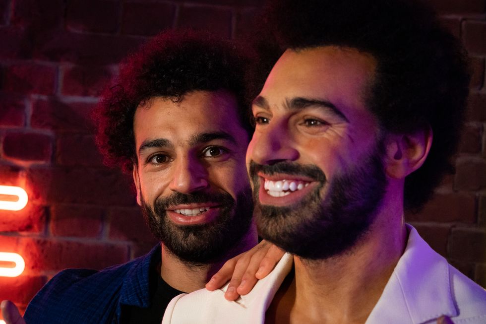Mohamed Salah (left) with his waxwork (right) at Madame Tussauds