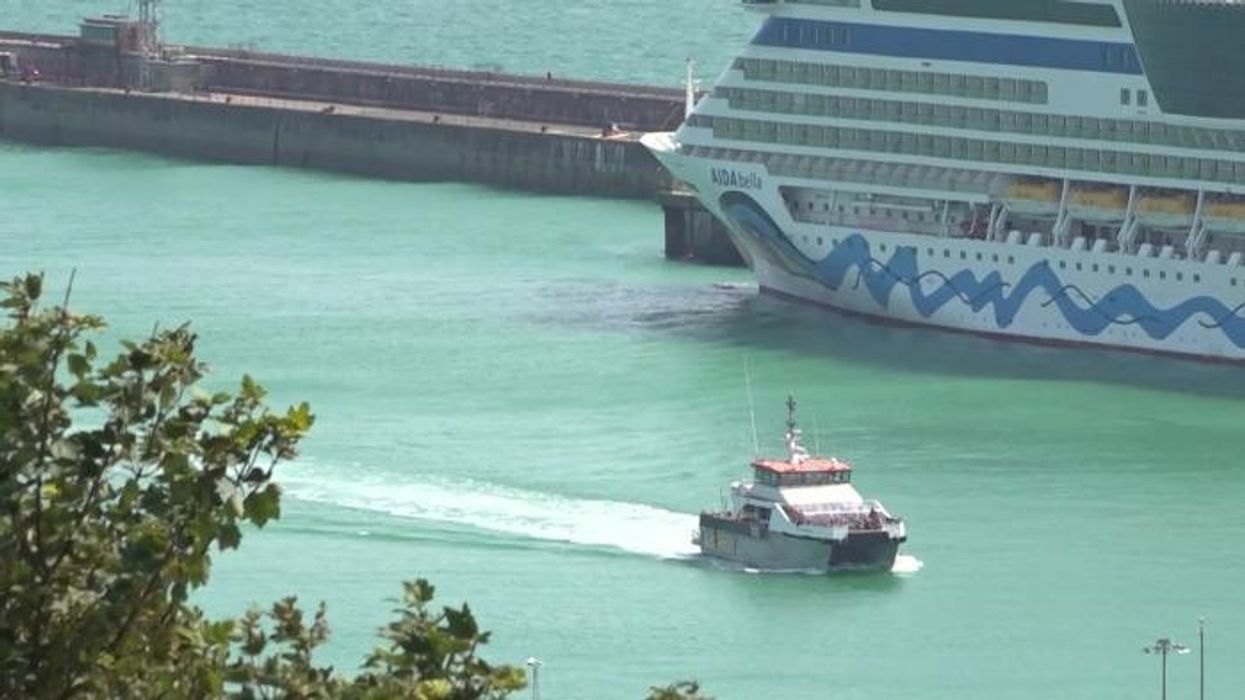 Embarrassing moment Hungarian migration expert LAUGHS at Britain's border crisis as he explains how his country fixed problem