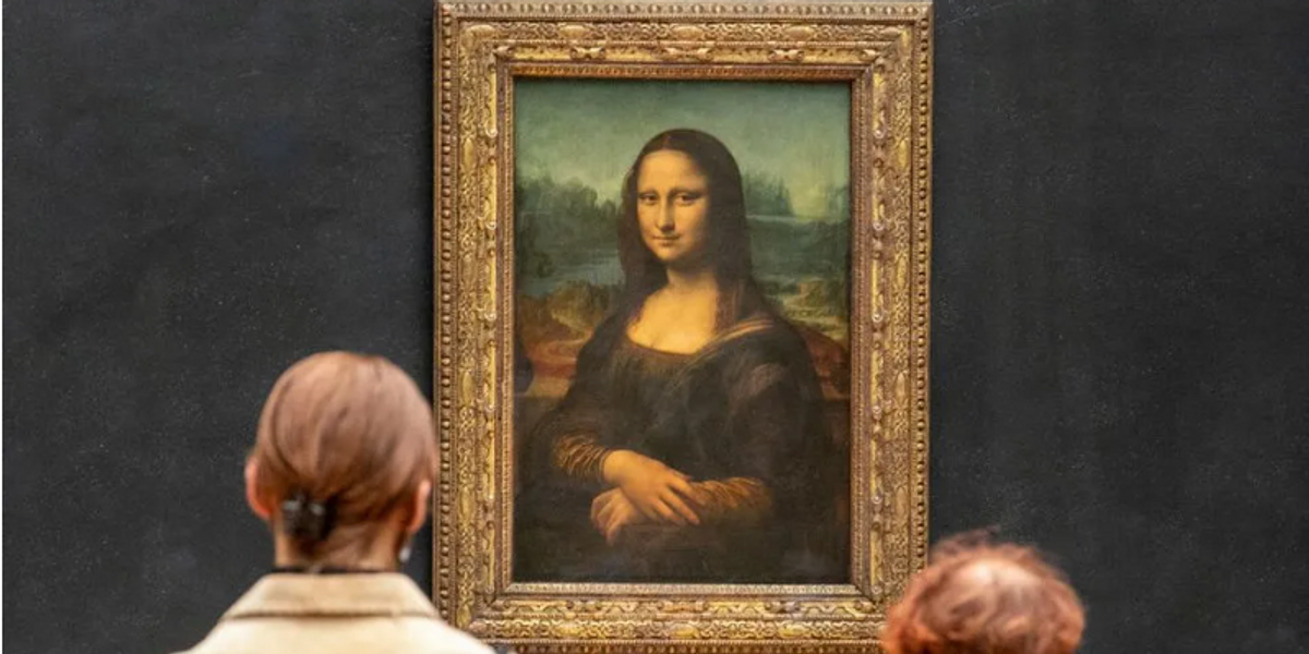 NextImg:Eco-protestors throw soup at Mona Lisa painting in latest climate stunt