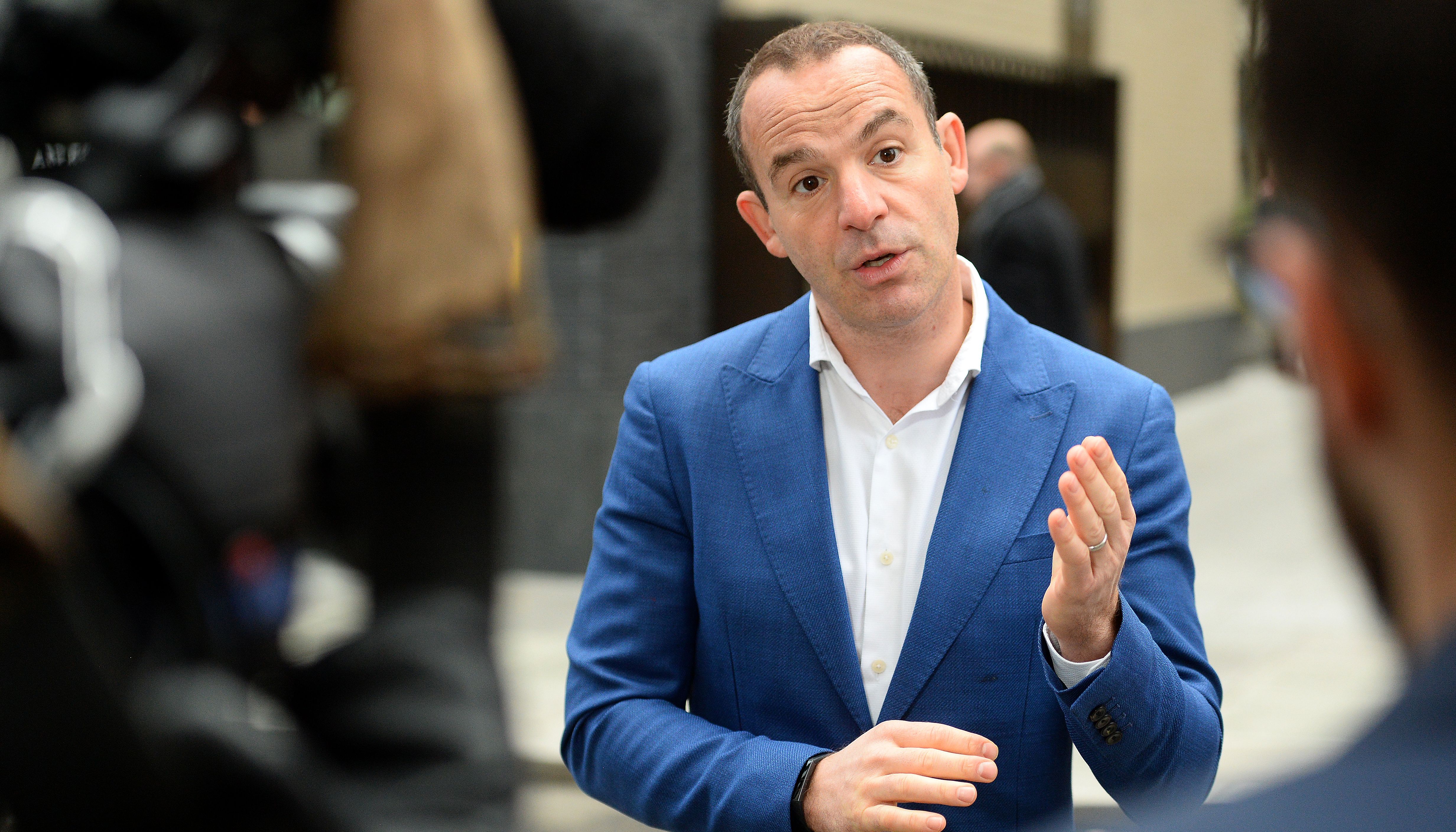 Money Saving Expert's Martin Lewis speaks to the media after a joint press conference with Facebook at the Facebook headquarters in London.