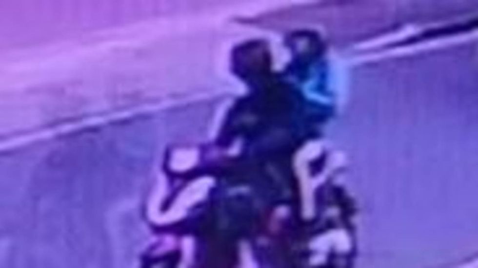 Moped with two people on that police would like to identify