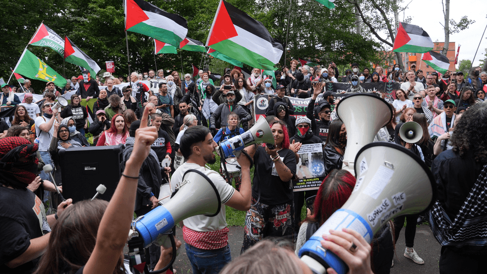 More than 100 pro-Palestine activists were arrested outside the court