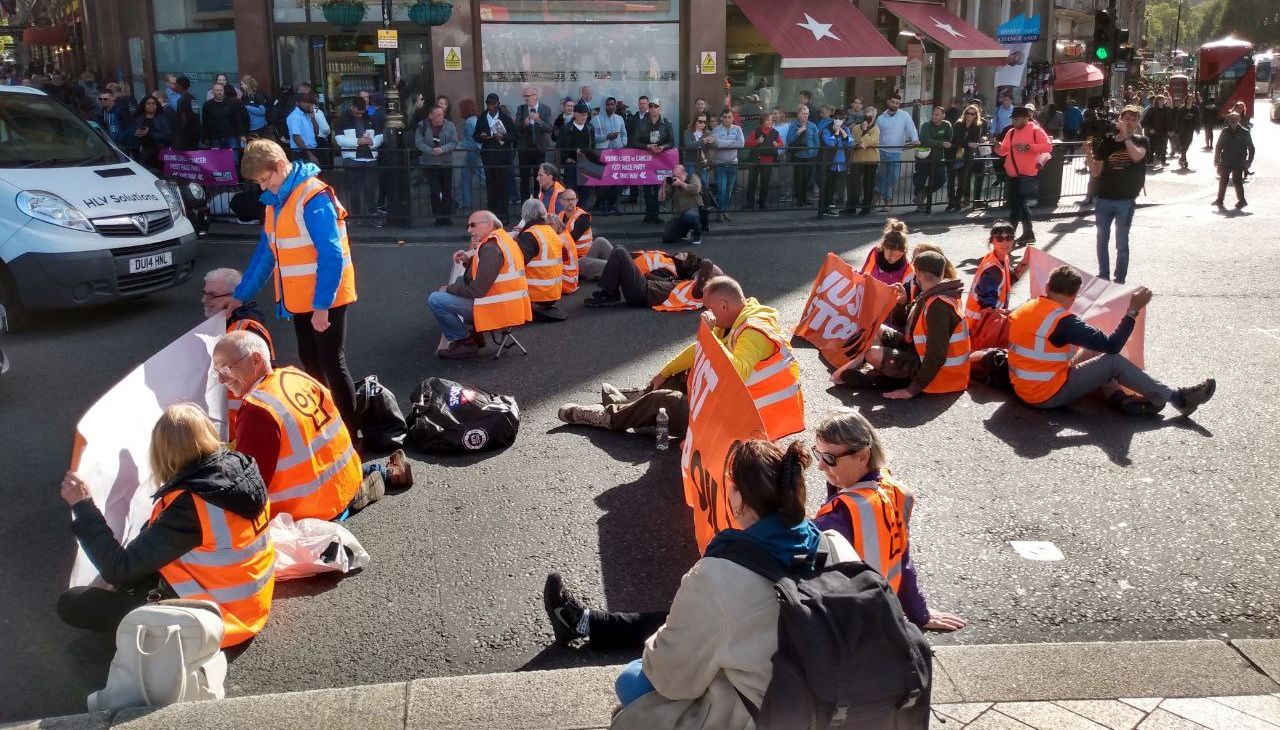 More than 30 Just Stop Oil protesters have been arrested after they glued themselves to roads surrounding Trafalgar Square in an attempt to block off the London landmark.