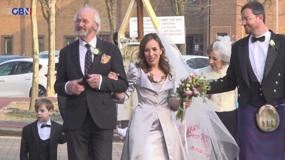 Julian Assange’s new wife makes tearful speech expressing her love after pair marry in prison