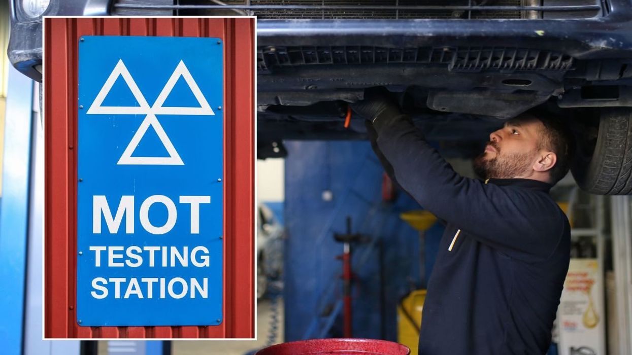 MOT testing station sign and a mechanic repairing a car