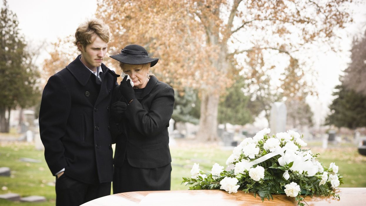 Mother and son at funeral