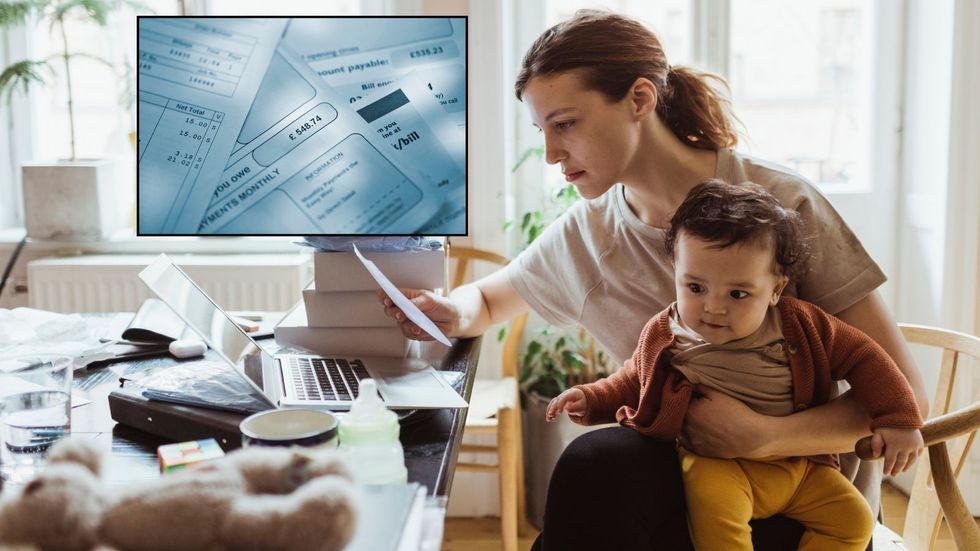 Mother looking at bills