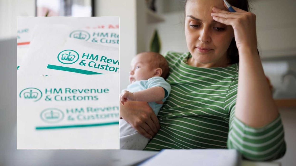 Mother with child and HMRC letter