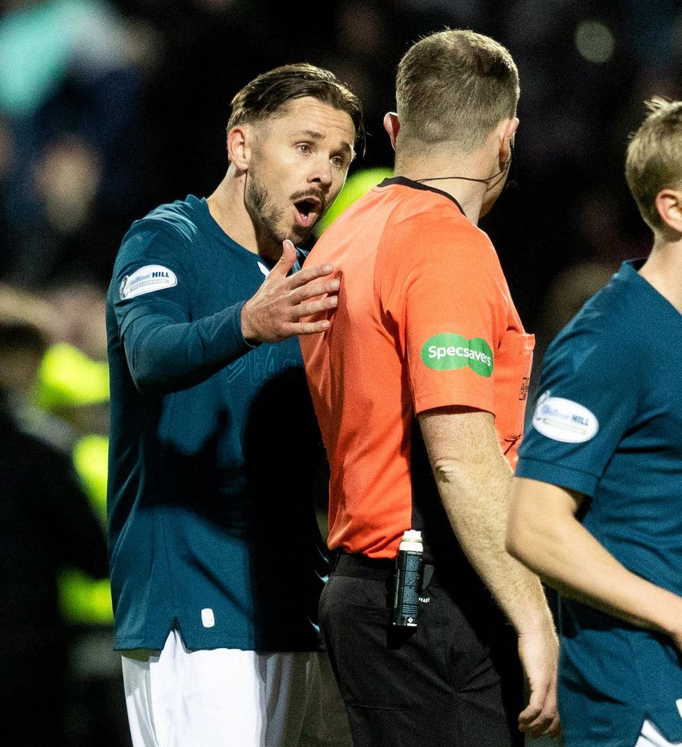 Motherwell star Sam Nicholson protested his innocence after being punished against Celtic
