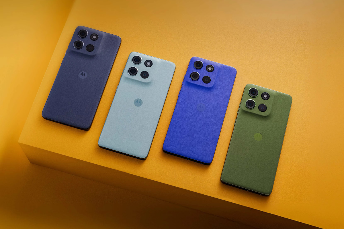 Moto G lineup pictured on a yellow surface