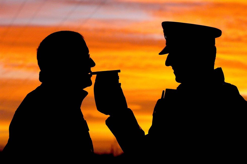 Motorist stopped by police to give a breath test
