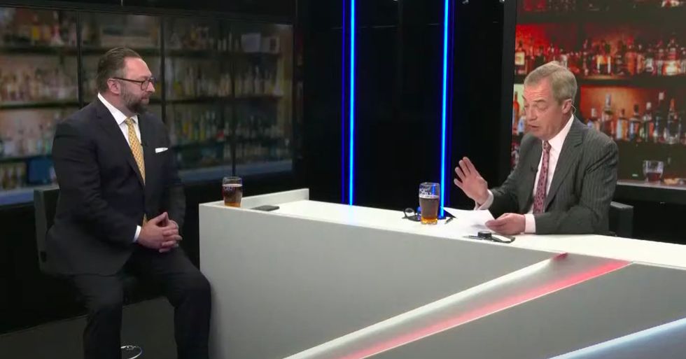 Mr Miller in discussion with Nigel Farage