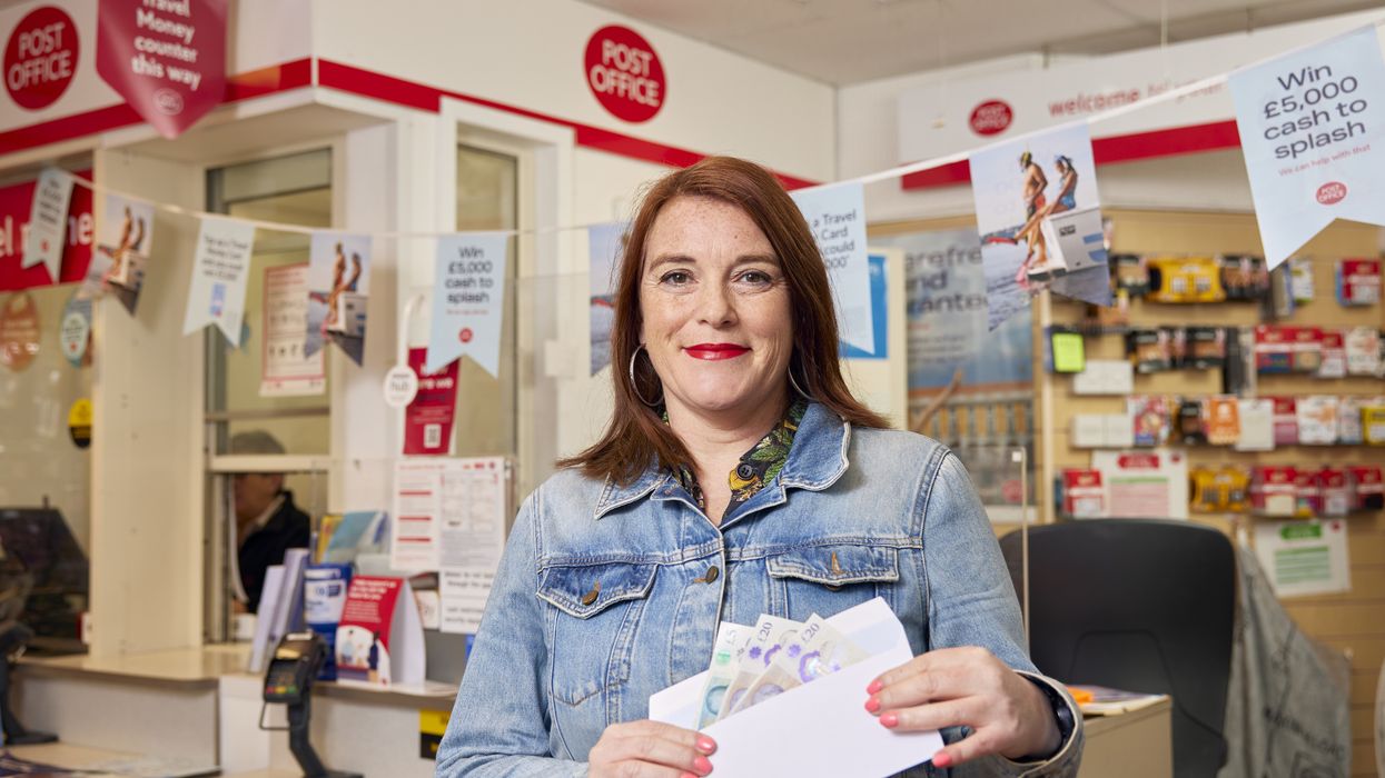 Mrs MummyPenny holding cash