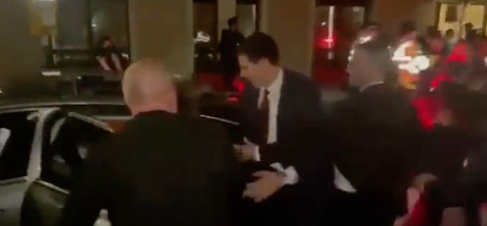 Ms Hotovely was escorted into her vehicle by security.